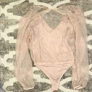 Pink express body suit never worn